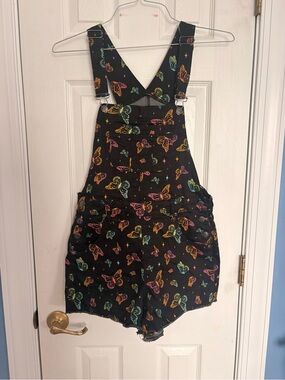 Hot Topic Black Short Overalls with Neon Butterfly Print